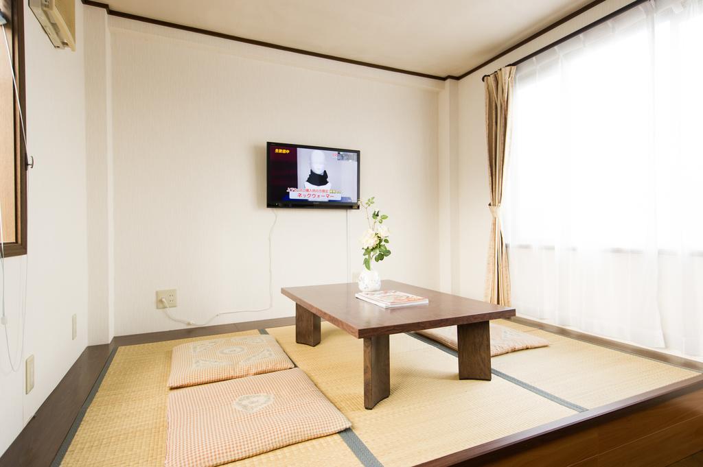 Guest House Izumi Bagian luar foto